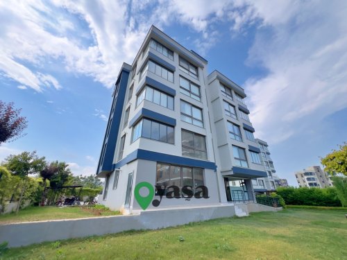 MEZİTLİ KUYULUK’TA BAHÇELİ 2+1 | 50 m² ÖZEL ALANLI SİTE İÇİ DAİRE